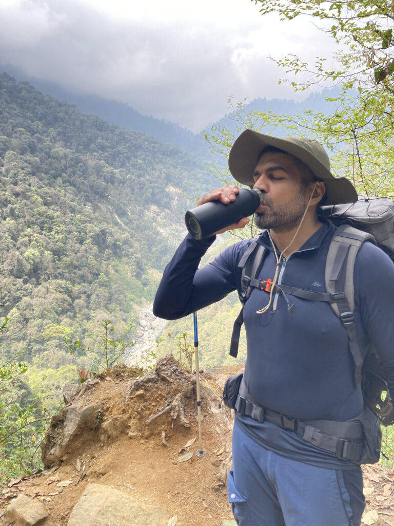 Trekker drinking water