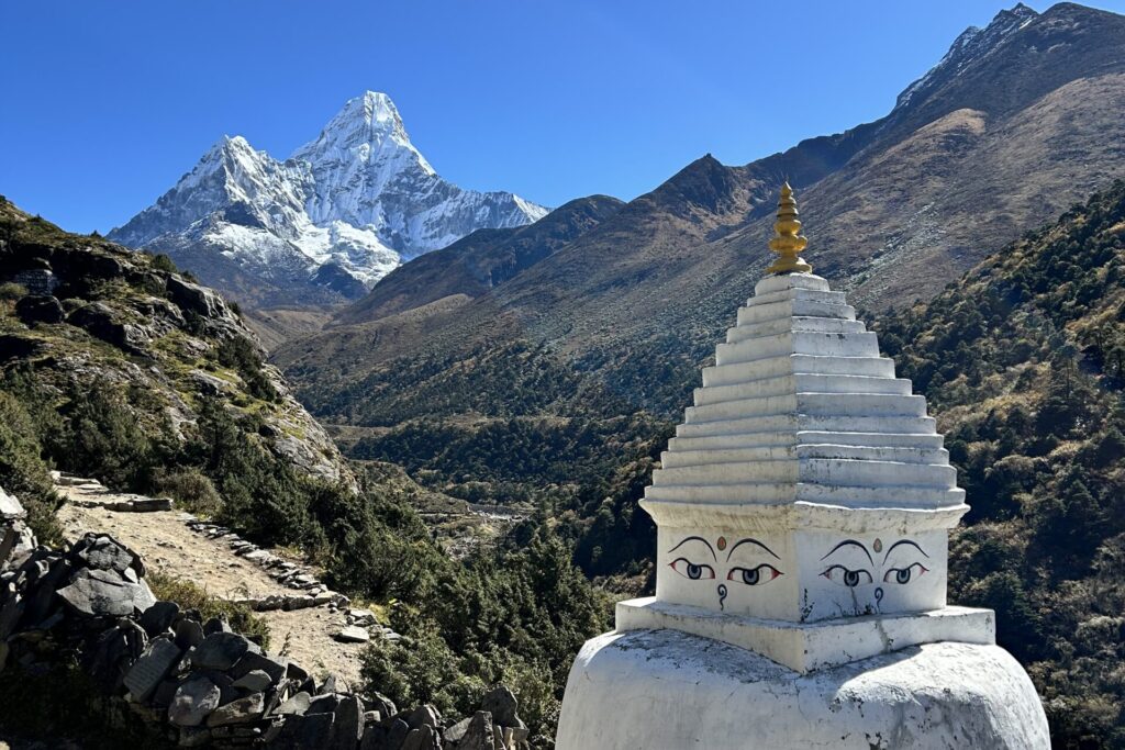 A stupa with the view of Ama Dablam in the background