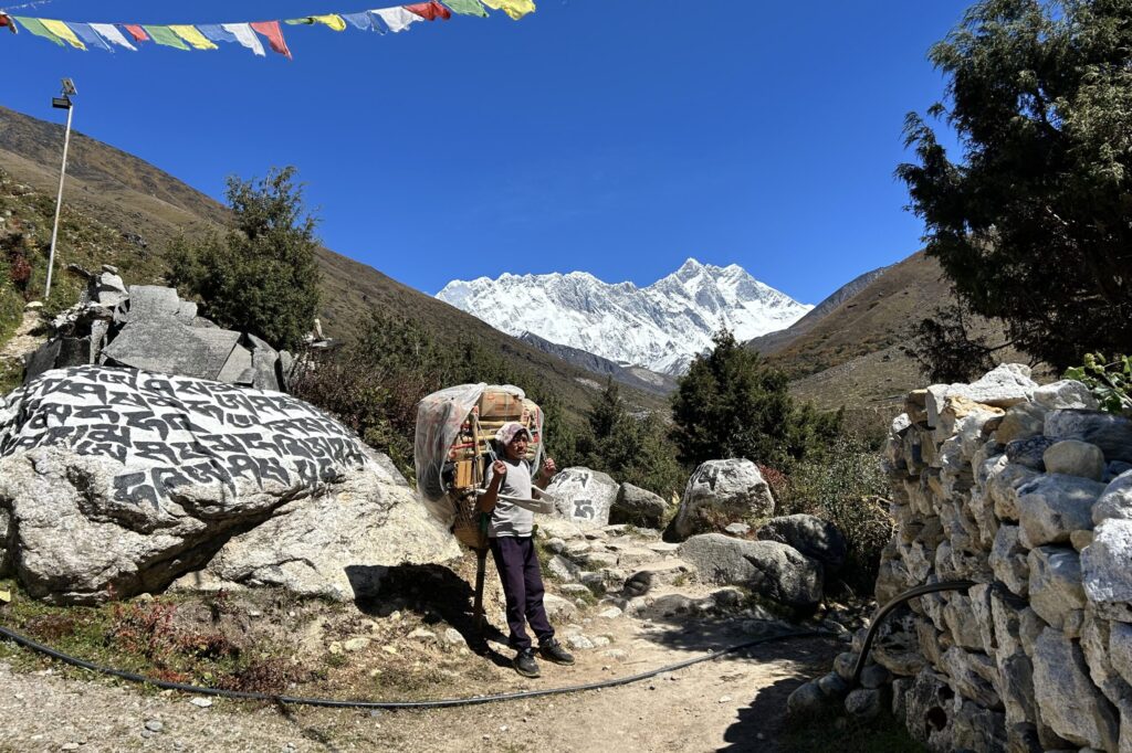 A porter resting on the Everest Base Camp Trek