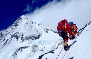 Climbers walking towards Mount Everest Summit.
