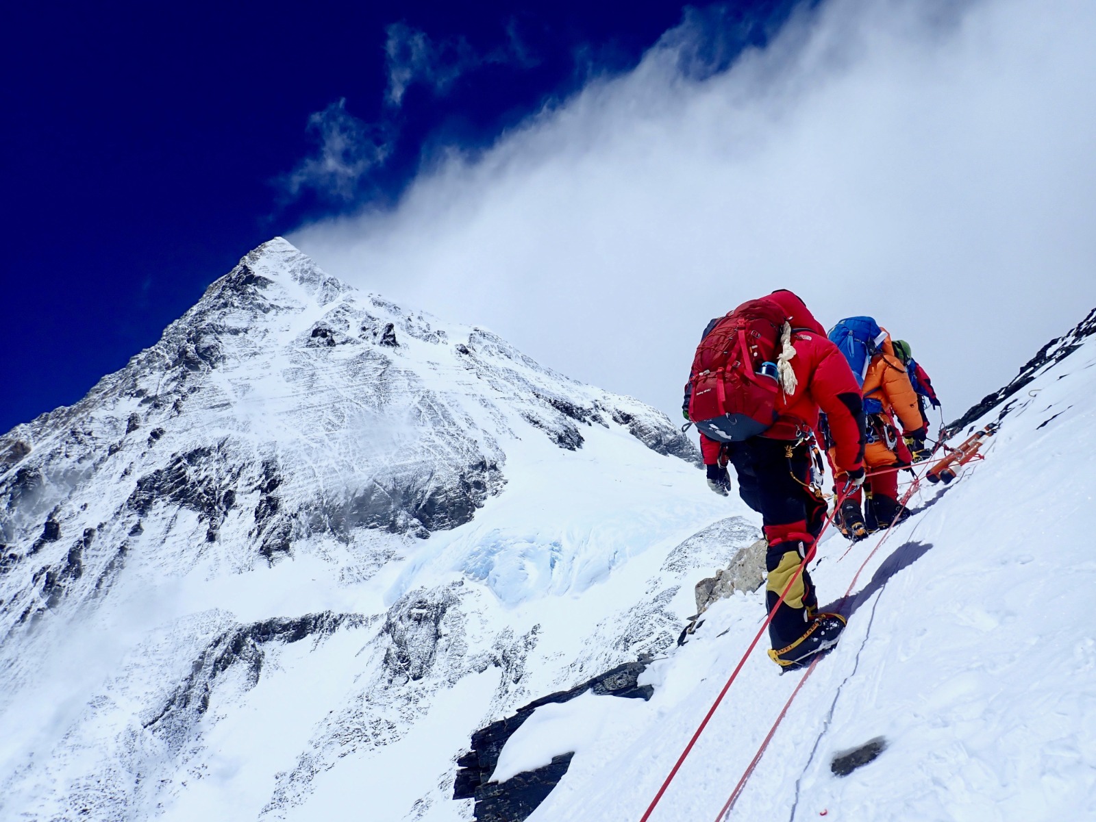 Crisis Management Blog 4 Climbers walking towards Mount Everest Summit.