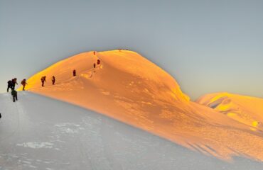 Golden sunlight on the summit of Mera Peak