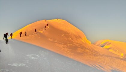 Golden sunlight on the summit of Mera Peak