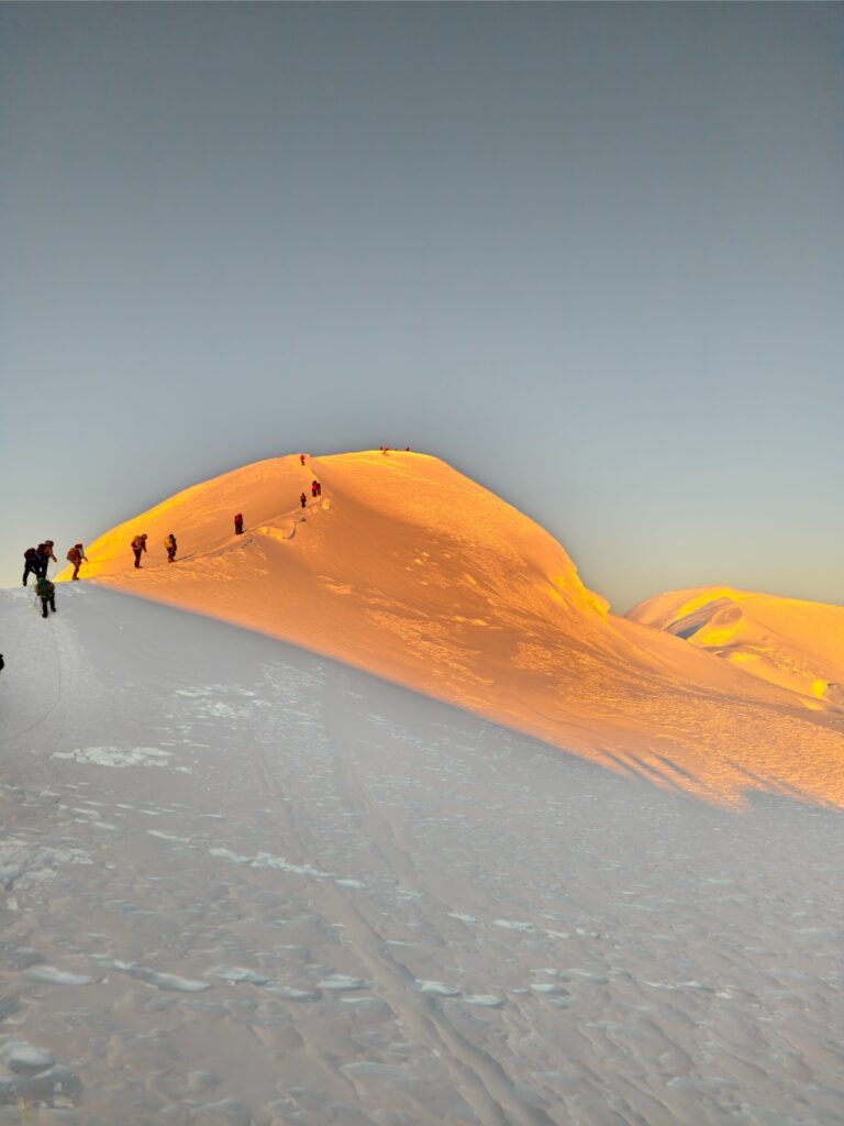 Golden sunlight on the summit of Mera Peak