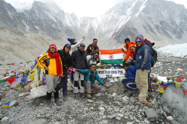 Everest Base Camp trekkers celebrating in the Himalayan mountains of Nepal