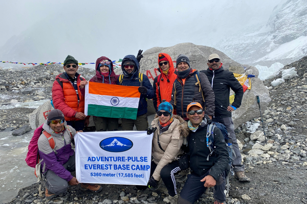 Trekkers holding Indian flag at Everest Base Camp Nepal during EBC trek